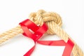 Simple knot on yellow background with esparto rope