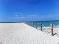 Rope fence and shadow on the beach. Royalty Free Stock Photo