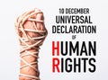 Rope on fist hand with 10 december universal declaration of HUMAN RIGHTS DAY text Royalty Free Stock Photo