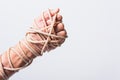 Rope on fist hand on white background, Human rights day concept Royalty Free Stock Photo