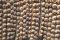 Rope with garlic at the market stall Royalty Free Stock Photo