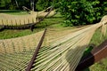 Rope hammocks on wooden supports in the park