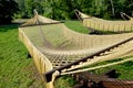 Rope hammocks on wooden supports in the park