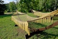 Rope hammocks on wooden supports in the park