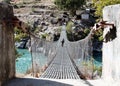 Rope hanging suspension bridge in Nepal Royalty Free Stock Photo