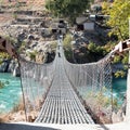 Rope hanging suspension bridge in Nepal Royalty Free Stock Photo