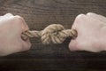 Rope knot as a strong nautical marine line tied together as a symbol for trust and strenght Royalty Free Stock Photo