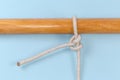 Rope knot Two half hitches tied around a wooden pole Royalty Free Stock Photo