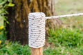 Rope knot on wood in garden