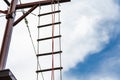 rope ladder against a blue sky Royalty Free Stock Photo