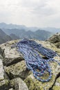 Rope is located on boulders on a mountain top Royalty Free Stock Photo