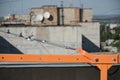 Rope lockers in rear beam of suspended wire rope platform for facade works on high multistorey buildings. Rope lockers blocks kink