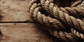 Rope lying discarded on wood floor web background Royalty Free Stock Photo