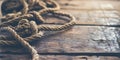 Rope lying discarded on wood floor web background Royalty Free Stock Photo