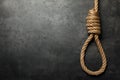 Rope noose with knot on grey table, top view. Space for text Royalty Free Stock Photo