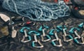 Rope safety, climbing and rock mountain sports equipment to be safe and secure. Sports tool setup zoom of carabiner an Royalty Free Stock Photo