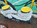 Rope on the ship is tied tightly so that ship does not drift when parked at the pier Royalty Free Stock Photo