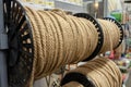 Rope on a show-window of shop. The rope is reeled up on the coil. Texture of a rope.