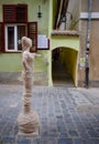 Rope Street from Brasov Romania after renovation. Statue view from the Stag Street.