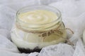 rope tied around lemon curd jar white lace fabric. High quality photo Royalty Free Stock Photo