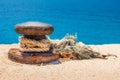 Rope tied around a mooring bollard Royalty Free Stock Photo