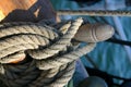 Rope tied around wooden cleat Royalty Free Stock Photo