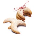 Rope tied pile of traditional Vanillekipferl vanilla kipferl cookies isolated on white background