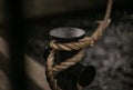 Rope tied to bollard sailboat, night photo Royalty Free Stock Photo