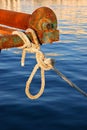 Rope tied to rusty old boat