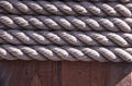 Rope on weathered wood background Royalty Free Stock Photo