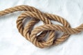 Rope on a white sand. Top view Royalty Free Stock Photo