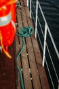 Rope on a yacht in a dark water Royalty Free Stock Photo