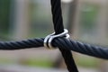Ropes bound together with metal attachments on a playground Royalty Free Stock Photo