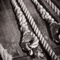 Ropes braided in bays on an ancient sailing vessel Royalty Free Stock Photo