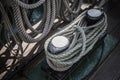 Ropes braided in bays on an ancient sailing vessel Royalty Free Stock Photo