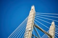 Ropes of a cable-stayed bridge against a blue sky Royalty Free Stock Photo
