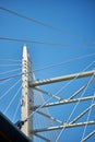 Ropes of a cable-stayed bridge against a blue sky Royalty Free Stock Photo