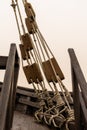 Ropes and rigging of an old wooden sailing ship in detail Royalty Free Stock Photo