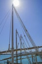 Ropes and spars of traditional rigging of dhow moored along Doha Old Town waterfront Royalty Free Stock Photo