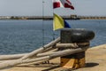 Ropes tied in a bollard of the port Royalty Free Stock Photo