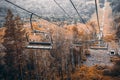 Ropeway over autumn hills Royalty Free Stock Photo