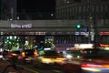 Roppongi Dori and Gaien Higashi Dori intersection at night with traffic light trails