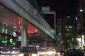 Roppongi intersection at night with taxi cabs