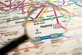 Roppongi Tokyo metro station on a printed metro map under a magnifier lens Royalty Free Stock Photo