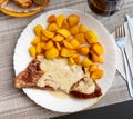 Roquefort veal steak served with fried potato