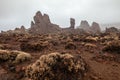Roques de Garcia covered with fog in Teide National Park in Tenerife island