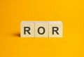 ROR, questions and answers on wooden cubes. Concept