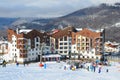 Rosa Khutor, Sochi, Russia, January, 26, 2018, People skiing near hotel `Rosa Skinn` in Olympic village on Rosa Khutor ski resort