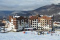 Rosa Khutor, Sochi, Russia, January, 26, 2018, People skiing near hotel `Rosa Skinn` in Olympic village on Rosa Khutor ski resort