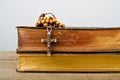 Rosary beads and books of Catholic Church liturgy Royalty Free Stock Photo